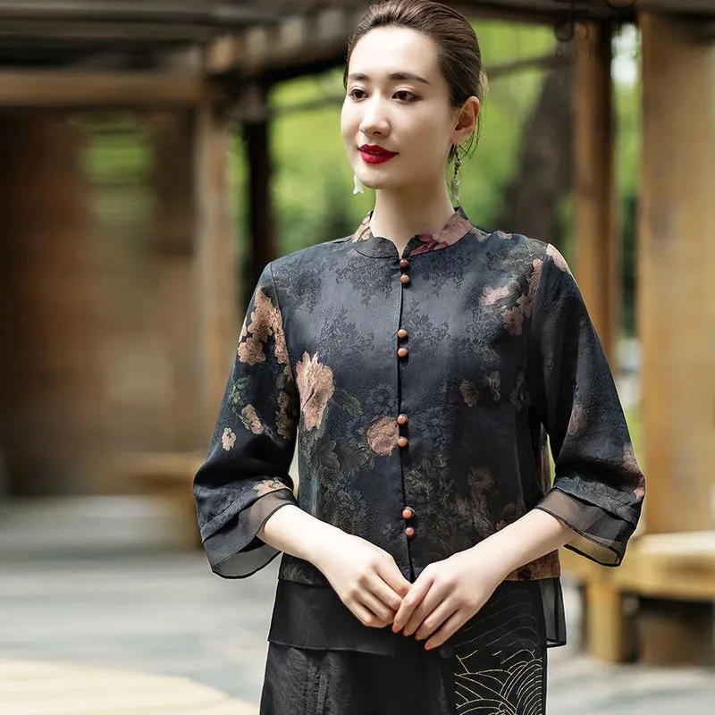 ดอกไม้ทะลุรู Luo ผ้าไหมเสื้อผู้หญิง 2022 ฤดูร้อนใหม่หลวมสไตล์จีนคอปกสามในสี่แขนเสื้อ