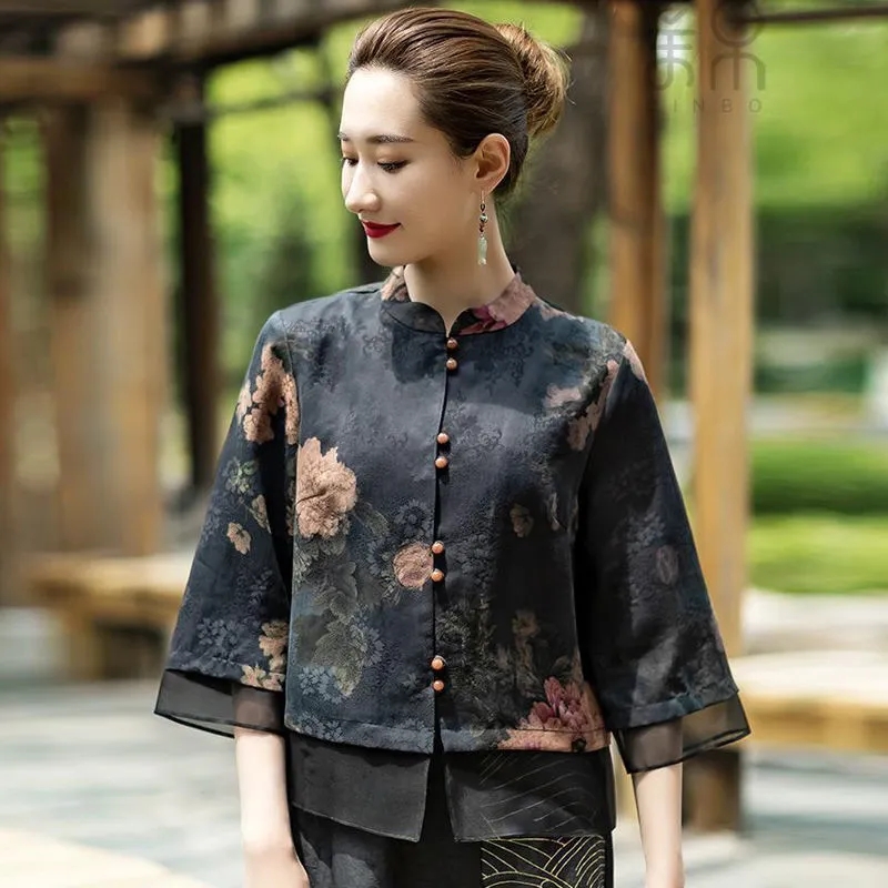 ดอกไม้ทะลุรู Luo ผ้าไหมเสื้อผู้หญิง 2022 ฤดูร้อนใหม่หลวมสไตล์จีนคอปกสามในสี่แขนเสื้อ
